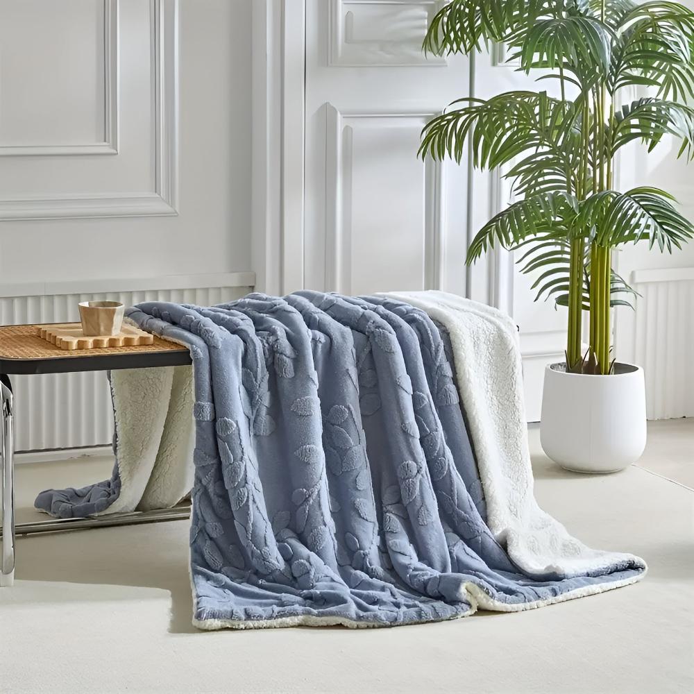 Elegante Sherpa-Decke mit Blattmotiv
