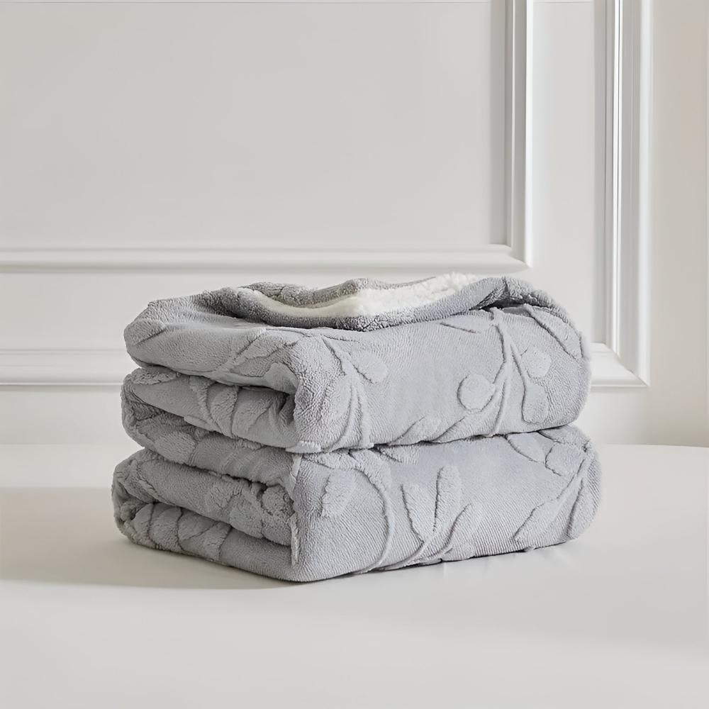 Elegante Sherpa-Decke mit Blattmotiv