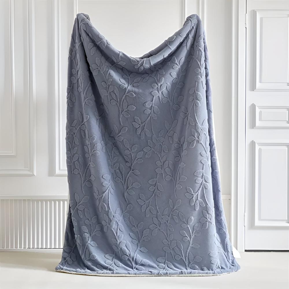 Elegante Sherpa-Decke mit Blattmotiv