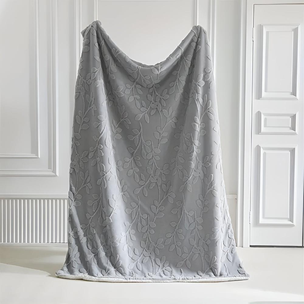 Elegante Sherpa-Decke mit Blattmotiv