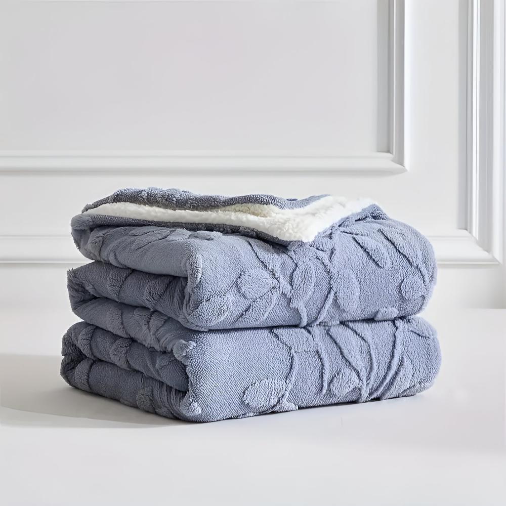 Elegante Sherpa-Decke mit Blattmotiv