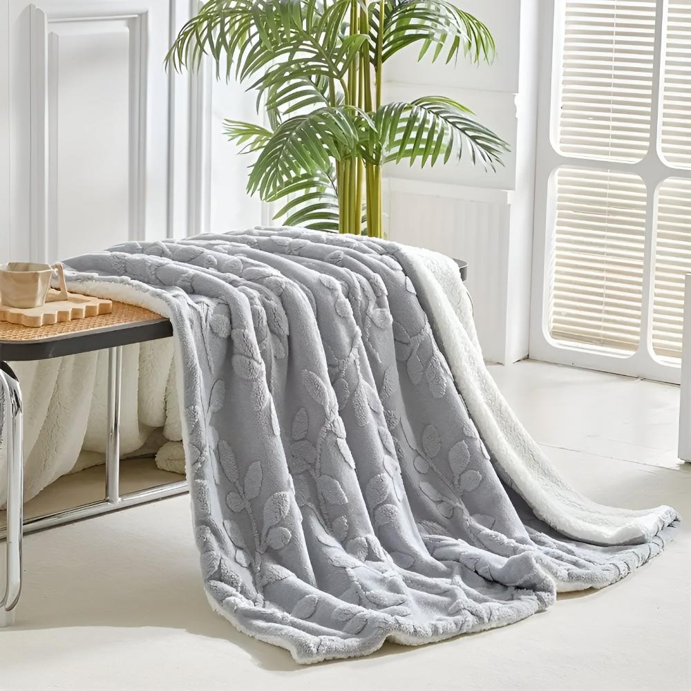 Elegante Sherpa-Decke mit Blattmotiv
