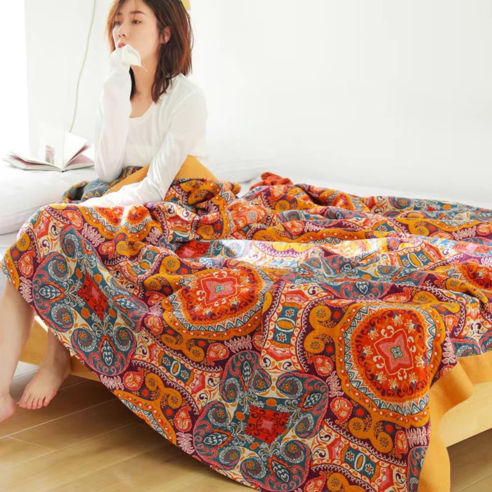 Wendbare Boho-Decke mit Sonnenaufgangs-Motiv