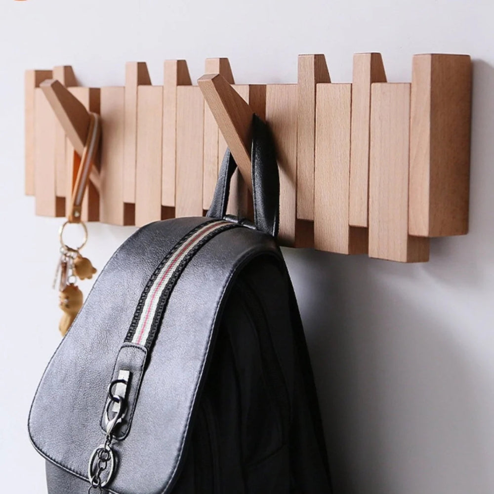 Wandgarderobe im Klavierstil – Klappbare Haken aus Holz